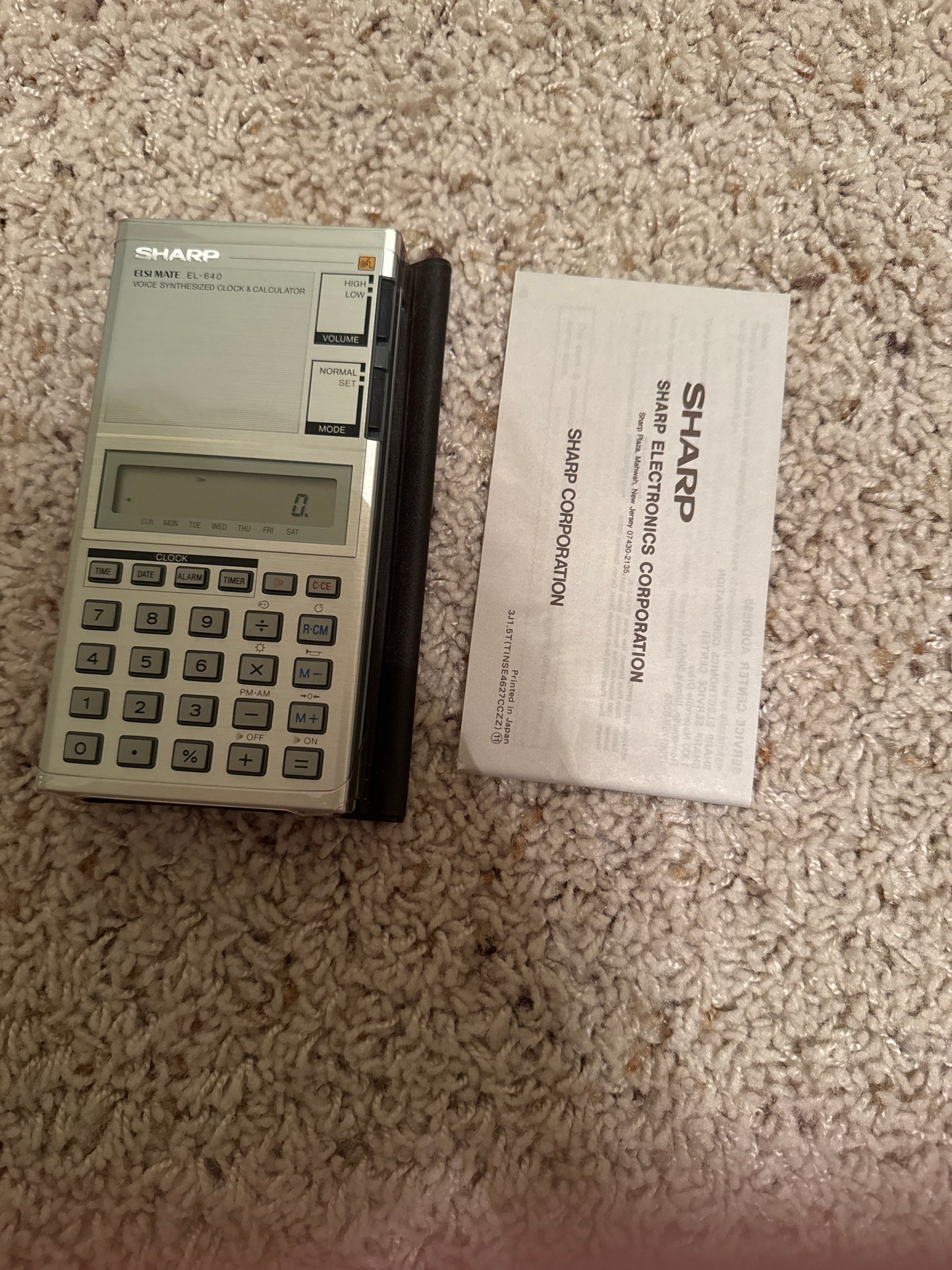 Sharp EL-640 Talking Calculator with talking clock, date, alarm, timer, hourly chime, daylight savings time button, 5 minute chime and volume adjustment. brand new in original box, with original folio case, and manual