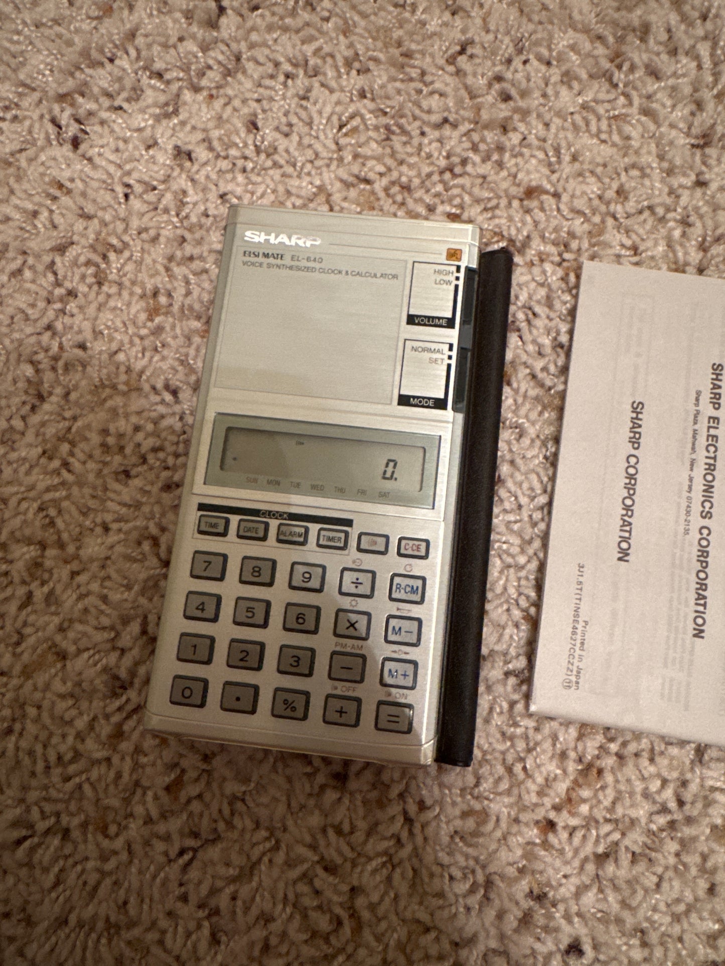 Sharp EL-640 Talking Calculator with talking clock, date, alarm, timer, hourly chime, daylight savings time button, 5 minute chime and volume adjustment. brand new in original box, with original folio case, and manual
