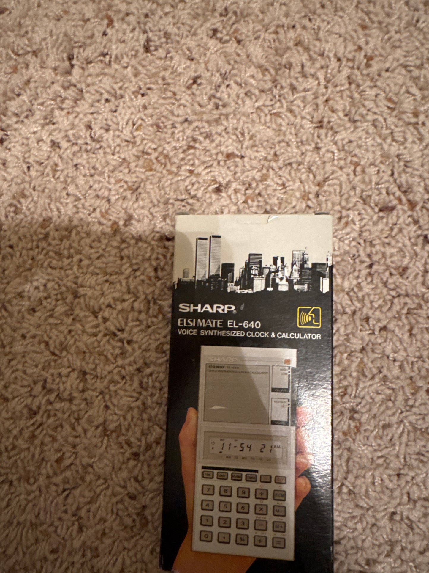 Sharp EL-640 Talking Calculator with talking clock, date, alarm, timer, hourly chime, daylight savings time button, 5 minute chime and volume adjustment. brand new in original box, with original folio case, and manual