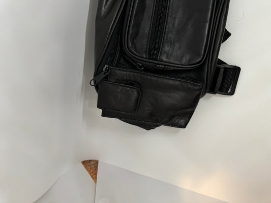 Genuine buttery soft lambskin leather Unisex waist fanny pack with 6 pockets, super cool water bottle holder, and adjustable up to 48 inches.