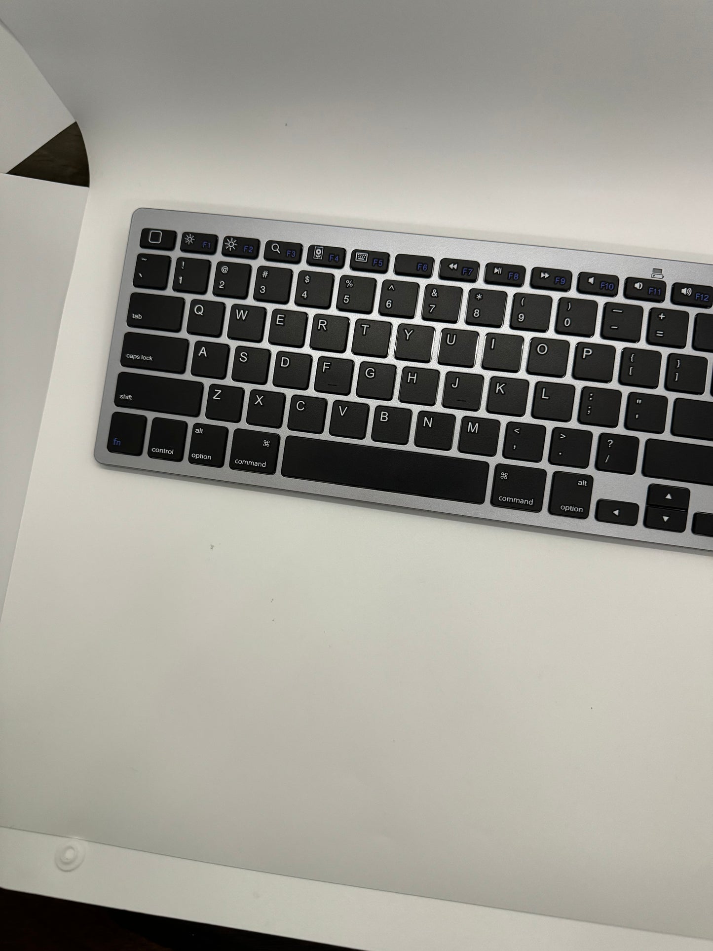 Super slim and lightweight portable Bluetooth Keyboard With Super Comfortable Cushioned Keys, easy pairing, and Compatibility With iOS, Android, Mac OS, or Windows