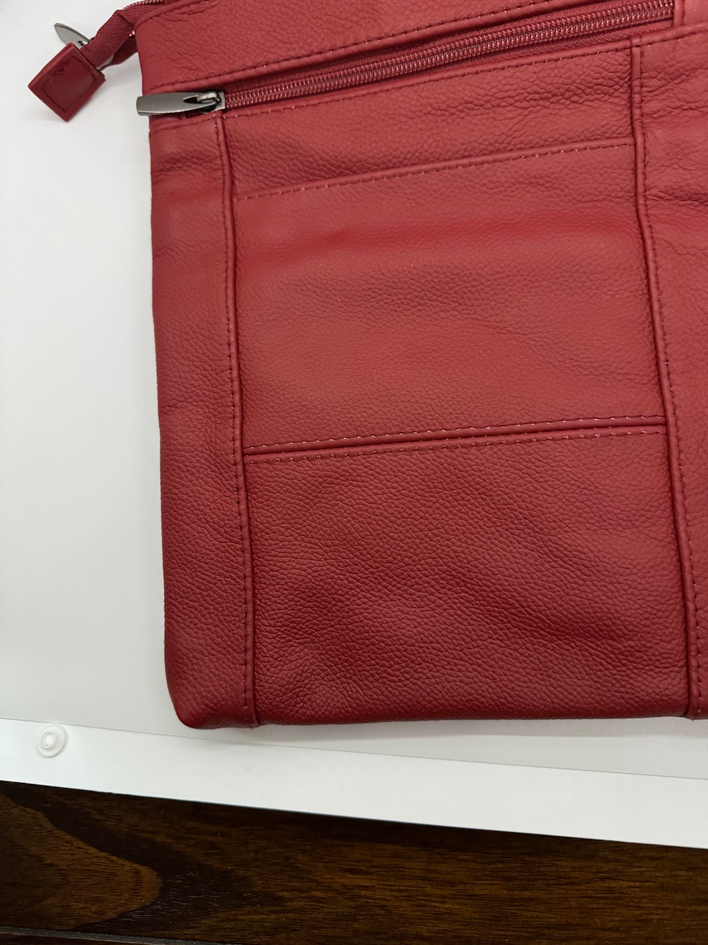 Stylish Unisex Genuine Leather Cross Body Bag With RFID Protection, Adjustable Shoulder Strap, 6 Storage Pockets and available in a variety of sizes and colors