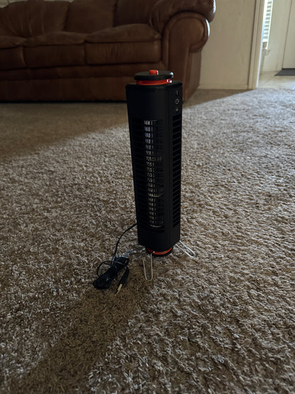 Portable USB powered tower fan with easy touch controls, ability to use standing up or lying flat, swivel base, and small size for travel