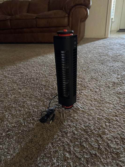 Portable USB powered tower fan with easy touch controls, ability to use standing up or lying flat, swivel base, and small size for travel