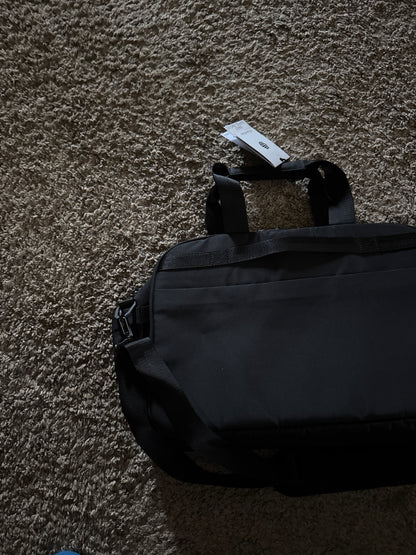Ballistic nylon water resistant super rugged briefcase bag with multiple pockets, fur lined laptop pocket, waterproof side pocket, removable shoulder strap, and tons of storage