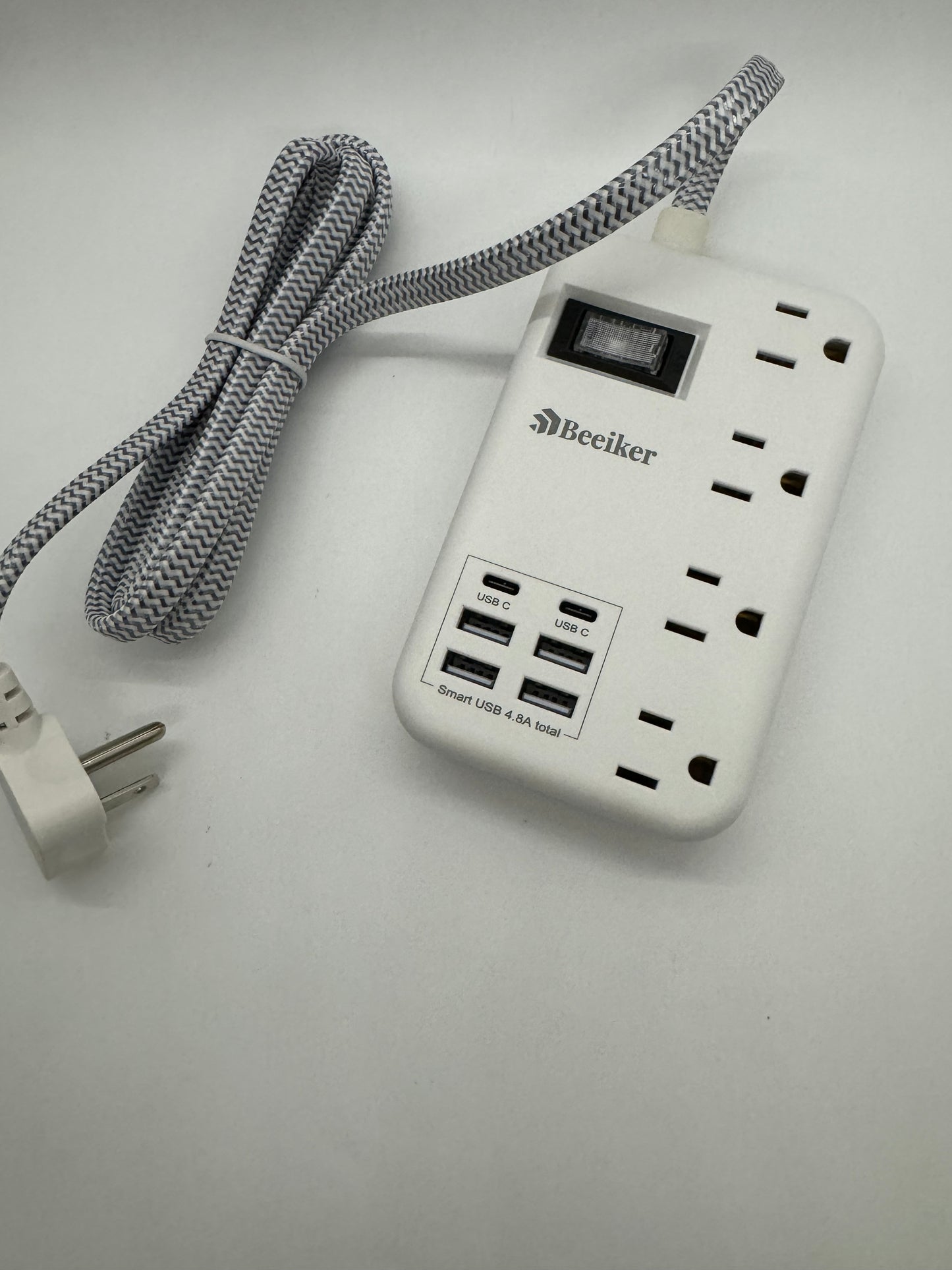 10 in 1 lightweight power strip with 980 jewels of surge protection, 4 AC outlets, 4 standard USB-A ports, and 2 USB-C ports. Power and charge up to 10 devices at one time