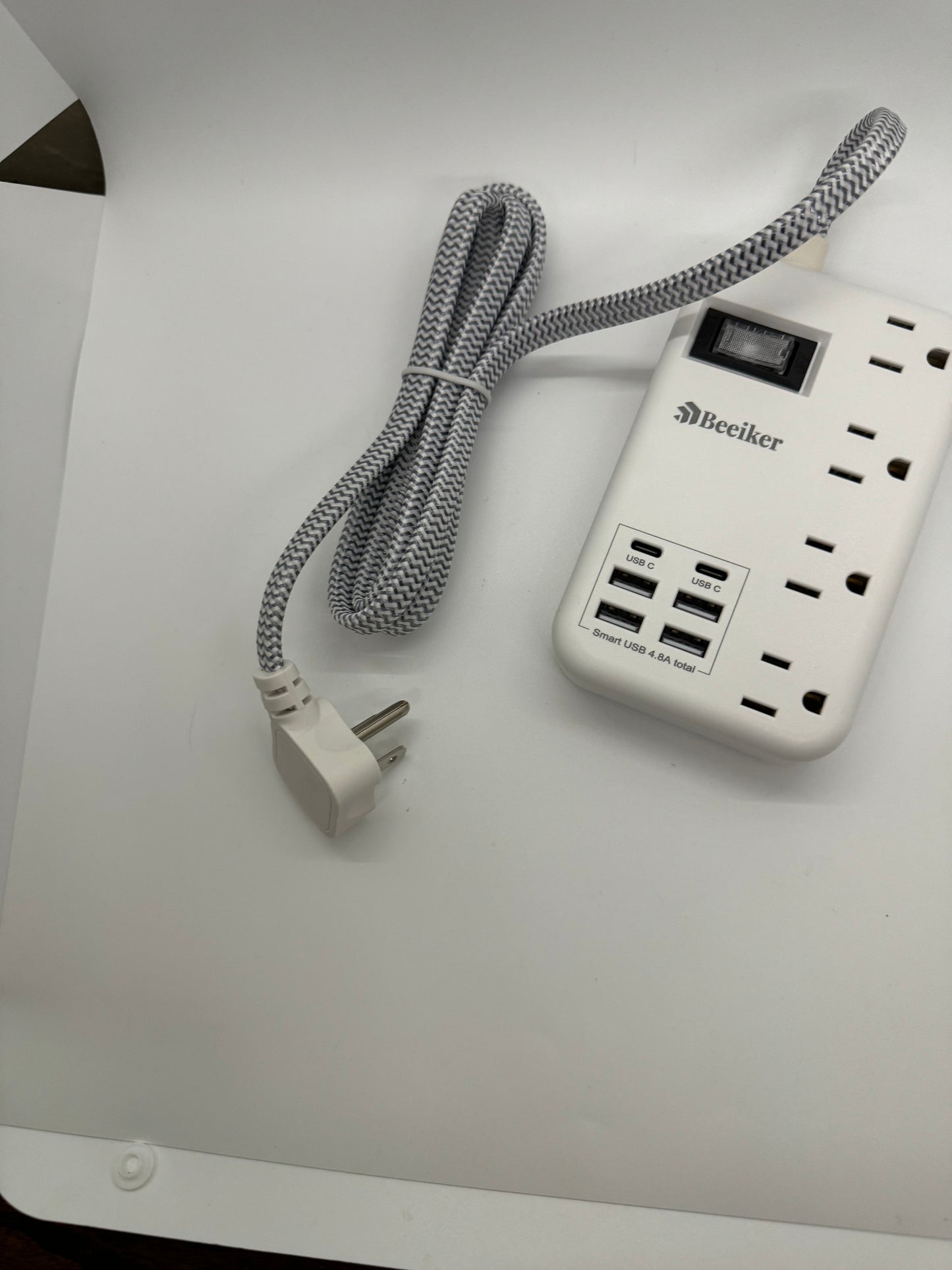 10 in 1 lightweight power strip with 980 jewels of surge protection, 4 AC outlets, 4 standard USB-A ports, and 2 USB-C ports. Power and charge up to 10 devices at one time